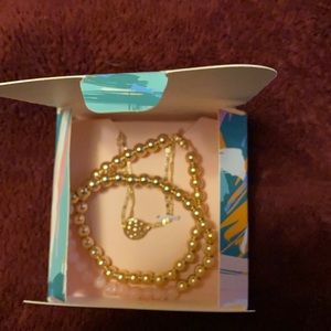 2 bracelets and necklace.